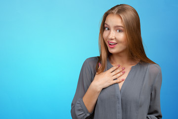  young business woman pointing at herself