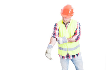 Male builder at work in protection clothes