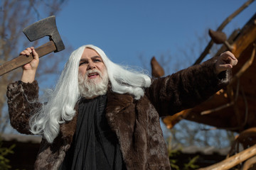 Brutal old druid with axe