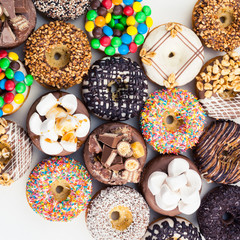 Close up of a selection of colorful donuts.