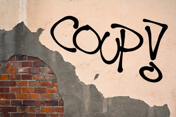 Coup - Handwritten graffiti sprayed on the wall, anarchist aesthetics - Putsch to depose politician...