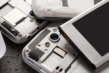 Disassembled cell phone with visible parts inside