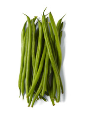 A pile of green beans isolated on a white background