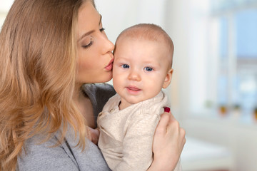 Happy young mother and her son