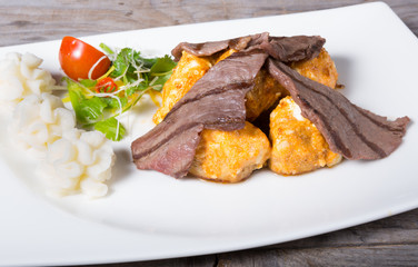 Fried beef with mushrooms