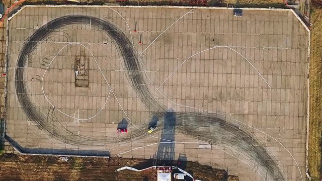 the car does drift on asphalt and burning tires