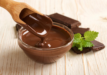 melted chocolate on a wooden background