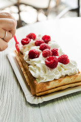women eating belgian waffles