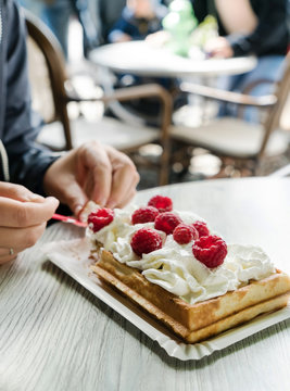 Women Eating Belgian Waffles