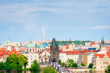 Fototapeta na wymiar City landscape with Charles bridge in Prague
