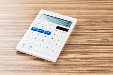Digital calculator on table close-up