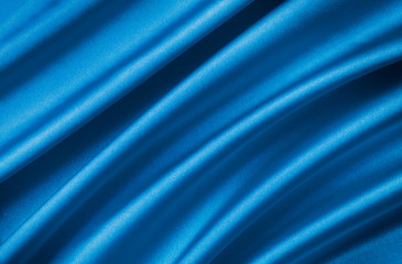 drape a .blue  satin fabric