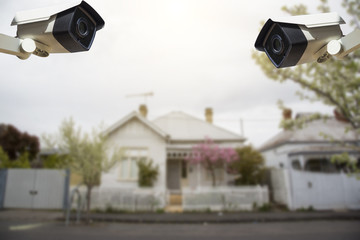 CCTV Security Camera  with house in background