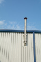 Ventilation chimneys on factory roof