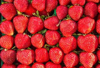 Ripe colorful strawberries close-up