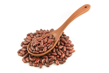 red beans in wooden spoon on white background