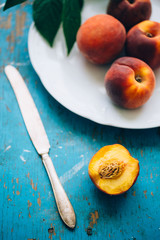 peaches on blue the texture wooden background