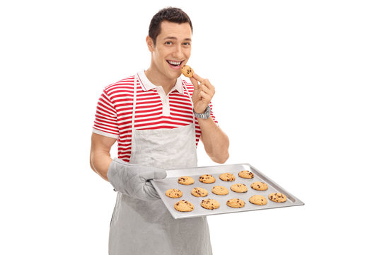 Cheerful Man Eating Cookies