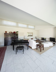 living room with piano of a modern house, interior