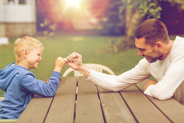 happy family in front of house outdoors