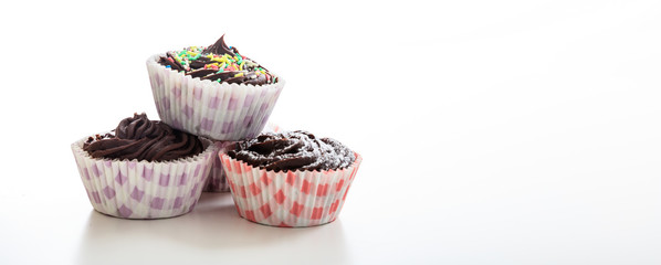 Cup chocolate cakes on a white background