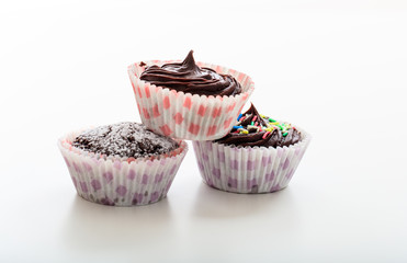 Cup chocolate cakes on a white background
