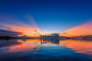 Fototapeta na wymiar Beautiful sunrise over the lake in Thailand