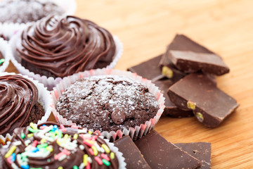 Cup cakes on a wooden surface