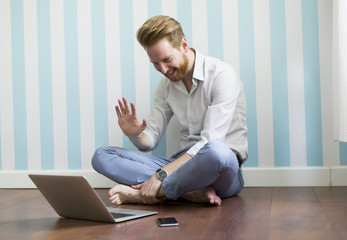 Young man working on laptop