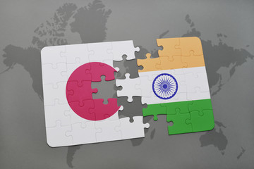 puzzle with the national flag of japan and india on a world map background. © luzitanija