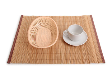 Coffee white cup  and basket on wooden table