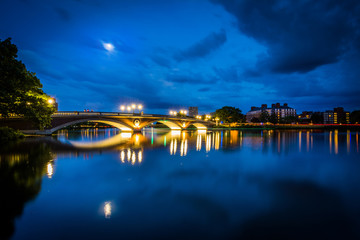 The moon over the John W Weeks Bridge and Charles River at night