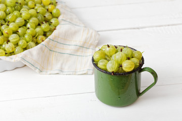 Grapes in an old metal green mug