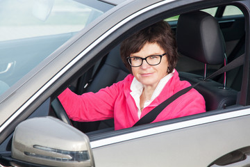 Middle-aged woman in the car