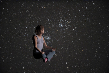 Fototapeta na wymiar 3d rendered illustration of a young woman in a yoga position with stars in the background