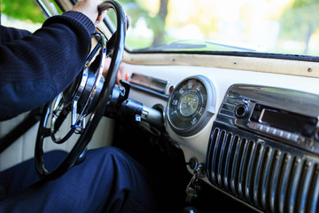 Interior part, dashboard of an old Soviet classic car Pobeda.