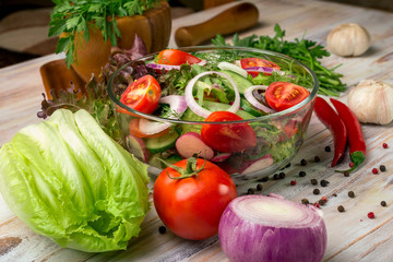 vegetable salad on a wooden background