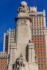 Monument of Miguel Cervantes on Plaza de Espana in Madrid, Spain - obrazy, fototapety, plakaty