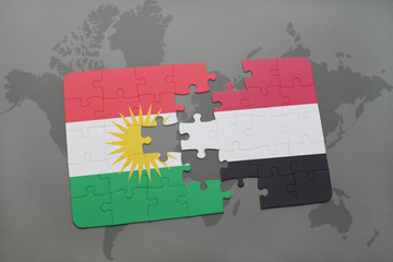 puzzle with the national flag of kurdistan and yemen on a world map background.