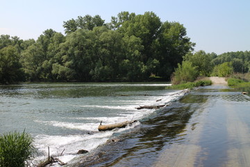 Fototapeta na wymiar Dam on Danube river arm near Vojka, Slovakia
