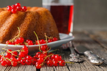 Breakfast with cake and red currant berries © Andrey Cherkasov