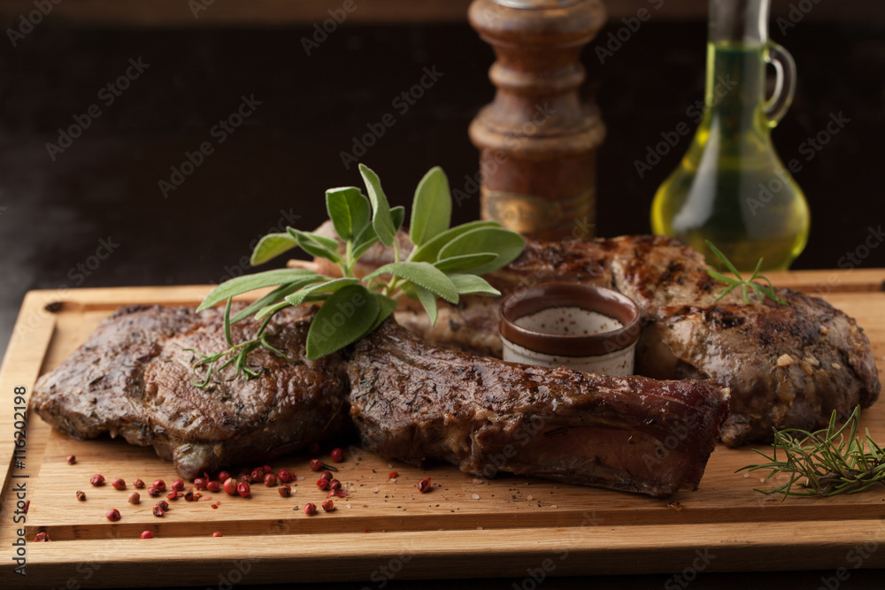 Sticker grilled beef steak with spices, rosemary and sage