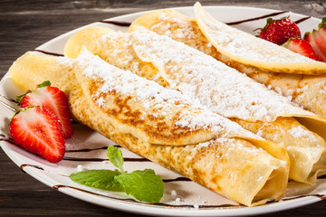 Crepes with strawberries and cream 