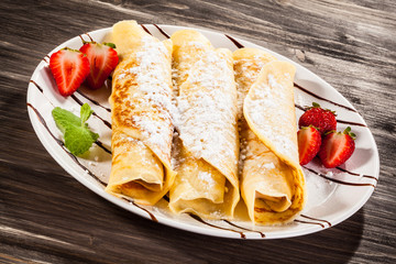 Crepes with strawberries and cream 