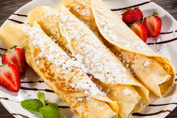 Crepes with strawberries and cream 