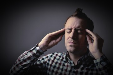 Man suffering from headache 