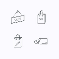 Sale, present bag and price tag icons.