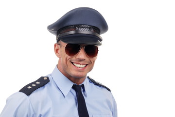 Portrait of young policeman in uniform with sunglasses