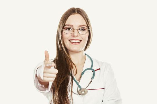 Woman Doctor With Stethoscope Pointing At You.