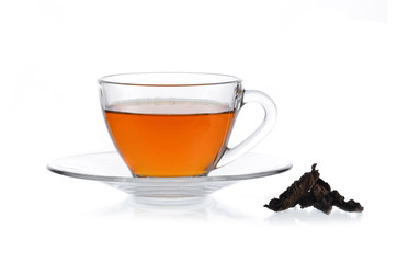 Glass cup of black tea isolated on white background